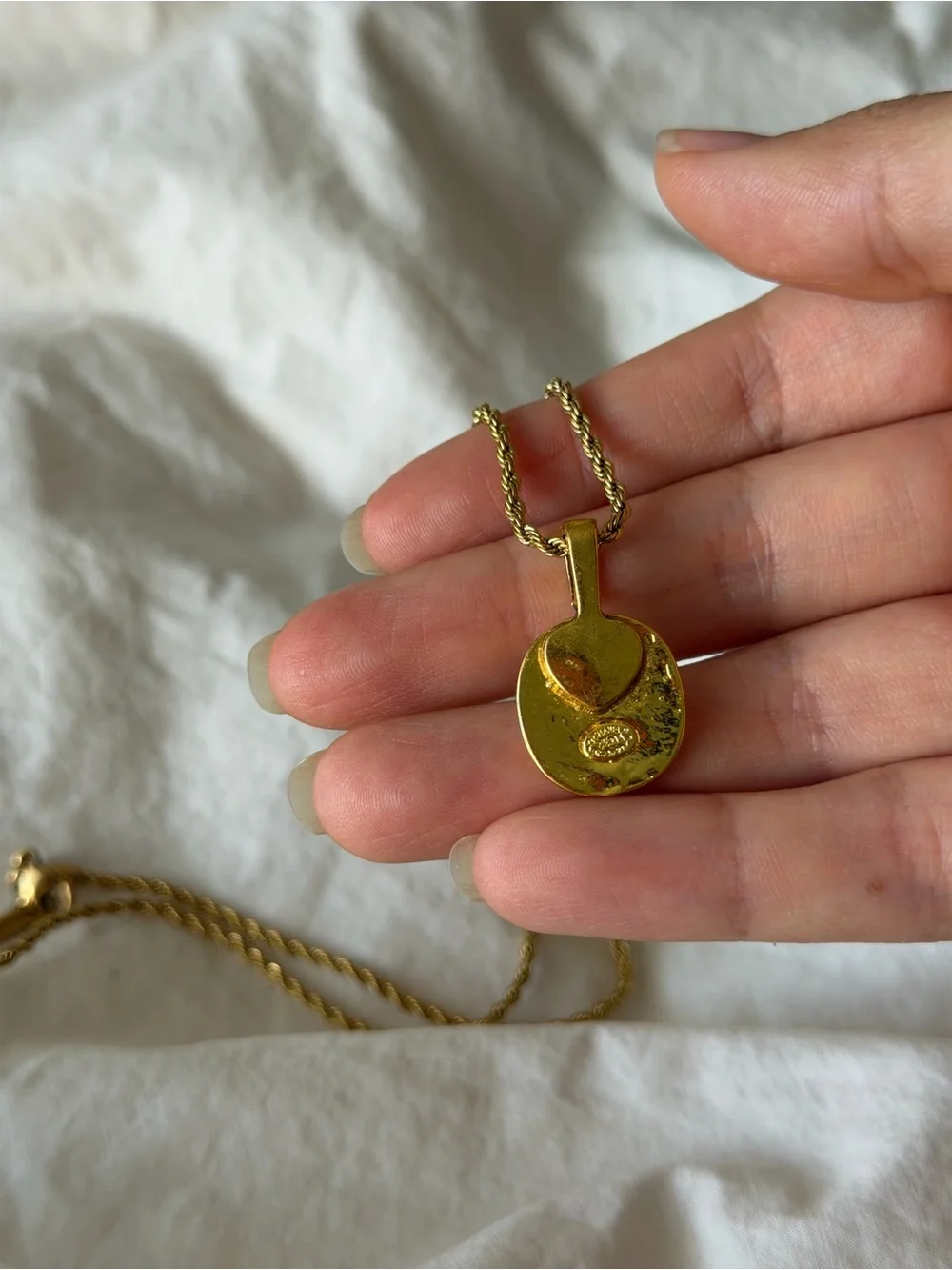 CHANEL Gold and Black Oval CC Pendant Necklace on Rope Chain